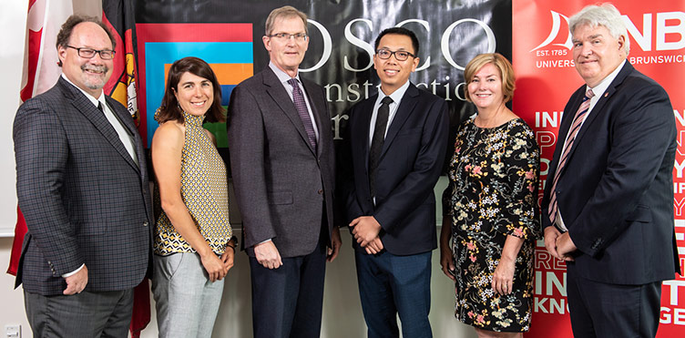 (L-R) Dr. David Magee, Vice President Research, UNB; Dr. Laura Richard, Director of Research, NBIF; Hans Klohn, President, OSCO Construction Group; Dr. Zhen Lei, OSCO Research Chair in Off-site Construction; Karen Ludwig, Member of Parliament for New Brunswick Southwest and Dr. Paul Mazerolle, President and Vice-Chancellor, UNB. Credit: Jeff Crawford/Photo UNB.