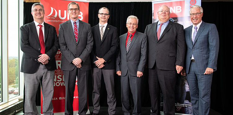 (L-R) Dr. Eddy Campbell, former President and Vice-Chancellor, UNB; Hans O. Klohn, President, OSCO Construction Group; Dr. Jeff Rankin, Chair of Civil Engineering, UNB; Dr. Chris Diduch, Dean of Engineering, UNB; John K.F. Irving, Chairman and CEO of OSCO Construction Group and President of Ocean Capital Holdings Limited; Bob Skillen, Vice-President (Advancement), UNB.