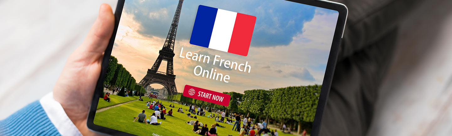 Tablet with Eiffel Tower and the words "Learn French Online"