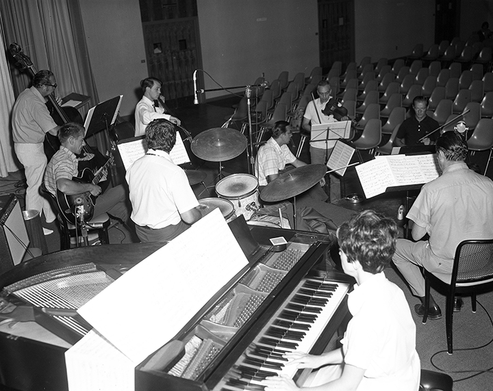 The Pachs seen rehearsing &#34Opus UNB&#34 with guest musicians for the 4th Summer Festival of Chamber Music, Memorial Hall, 1969. Courtesy of UNB Archives, UA RG 340, 8111c