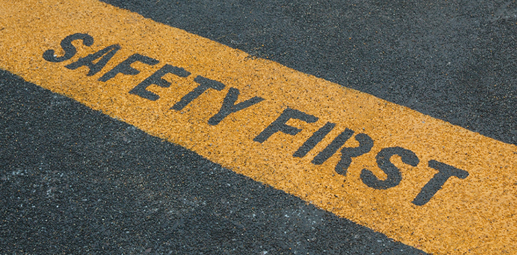 Pavement with the words "Safety First"