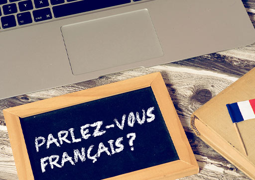 A board with the words "Parlez-vous francais?"
