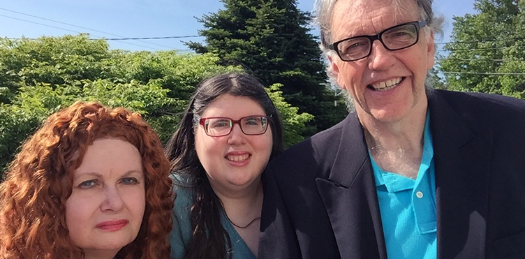 Summer and Leo Coyle with their daughter Lyla at centre