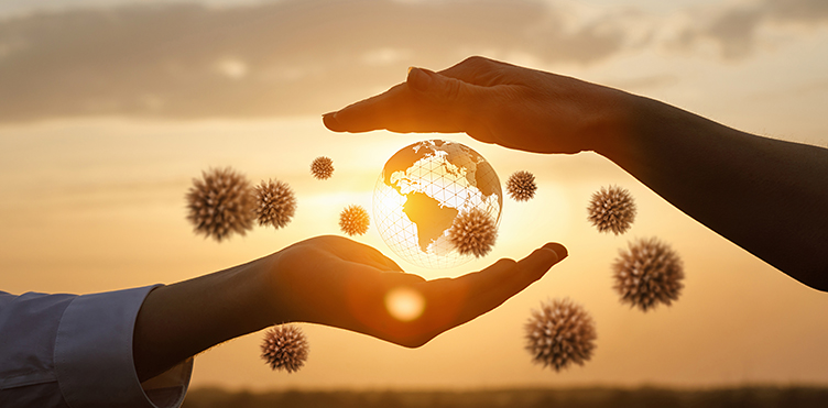 A digital transparent earth is photographed in front of the sun.