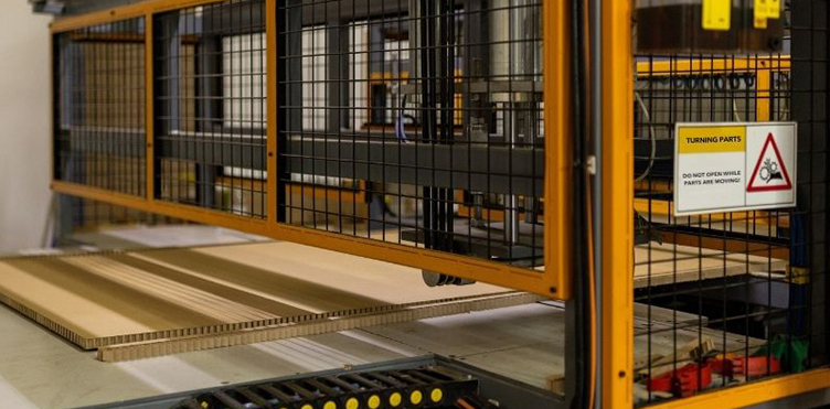 A heavy duty machine with safety warning.