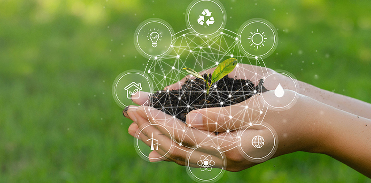 Hands holding a young plant with graphics related to environmental resources.
