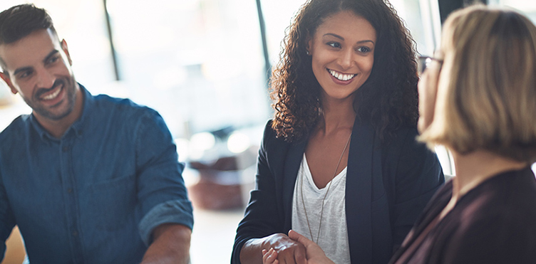 Photo of professionals engaging with each other