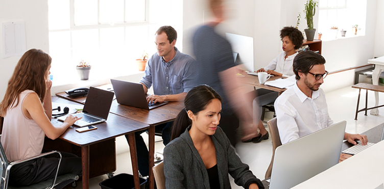 Photo of professionals working in an office