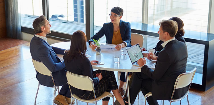 Photo of a group of professionals in a meeting