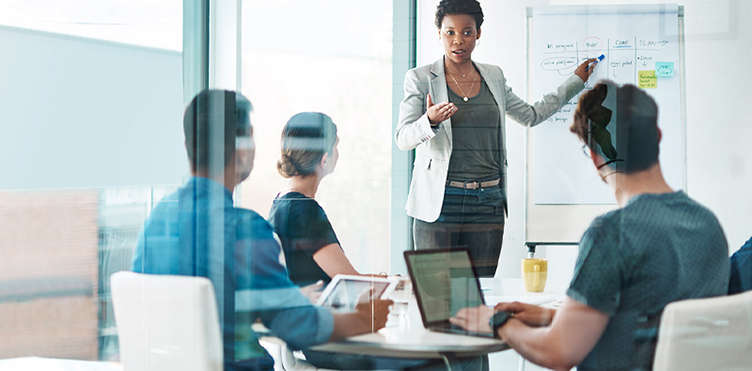 Photo of a professional facilitating a meeting