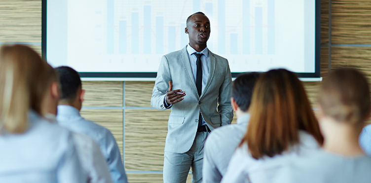 Photo of a professional conducting a training seminar