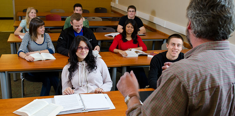 Photo of a professor teaching students