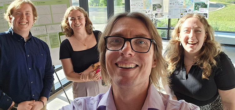 Dr. Hanson and his research team presenting research findings on location