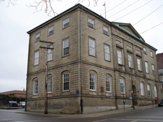 The old jail, which was demolished in the 1970s, was in the rear of this building. Slavin was hanged from a gallows platform built outside the jail (on the left in this picture).